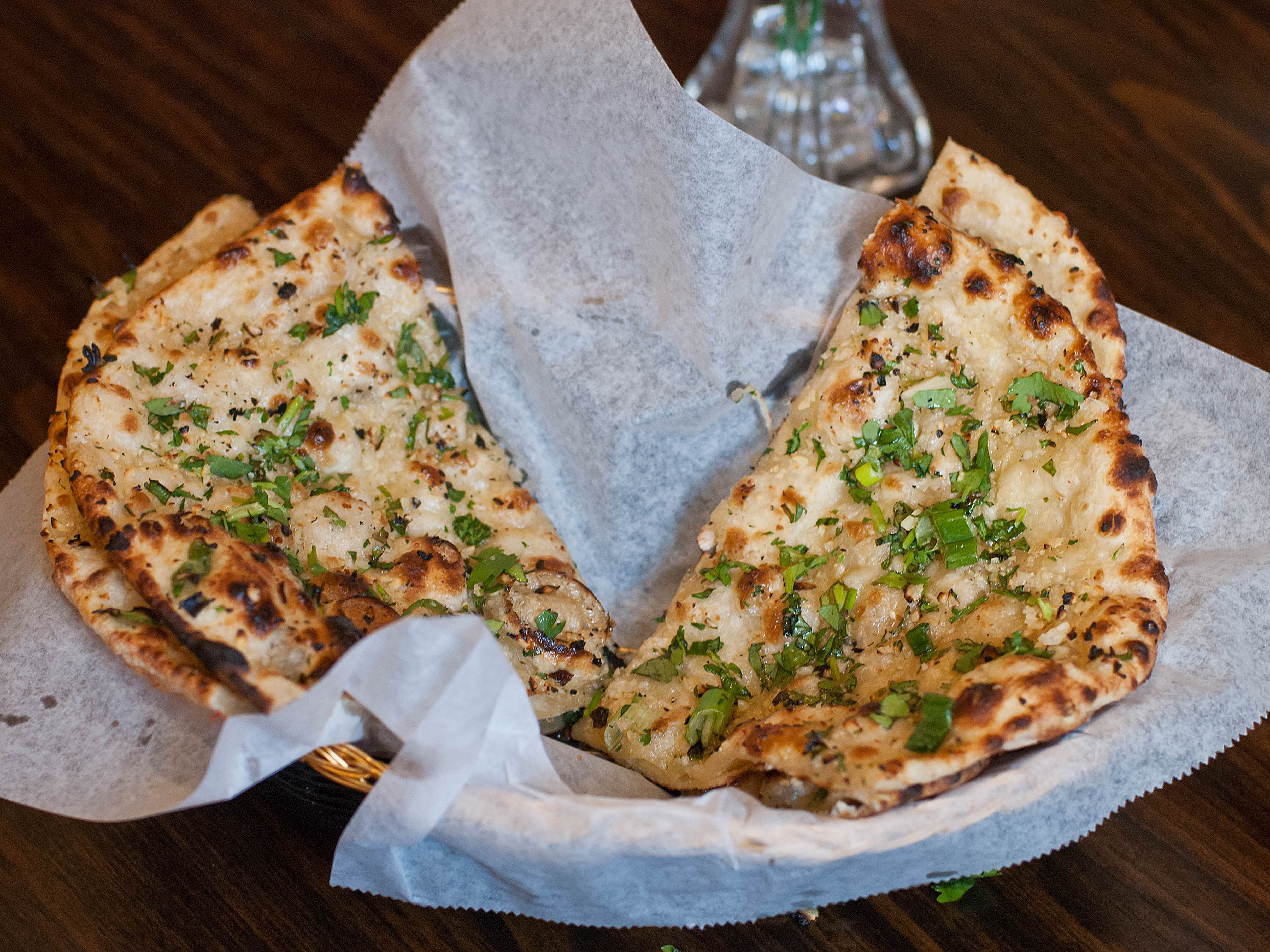 Order Garlic Naan food online from Royal Kitchen store, Oakland on bringmethat.com