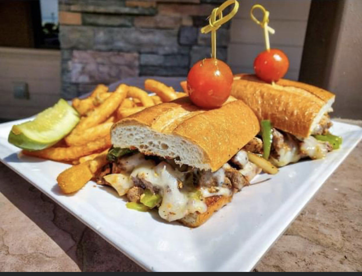 Order Philly Cheese steak sandwich food online from Sugar Pine Smokehouse store, Madera on bringmethat.com