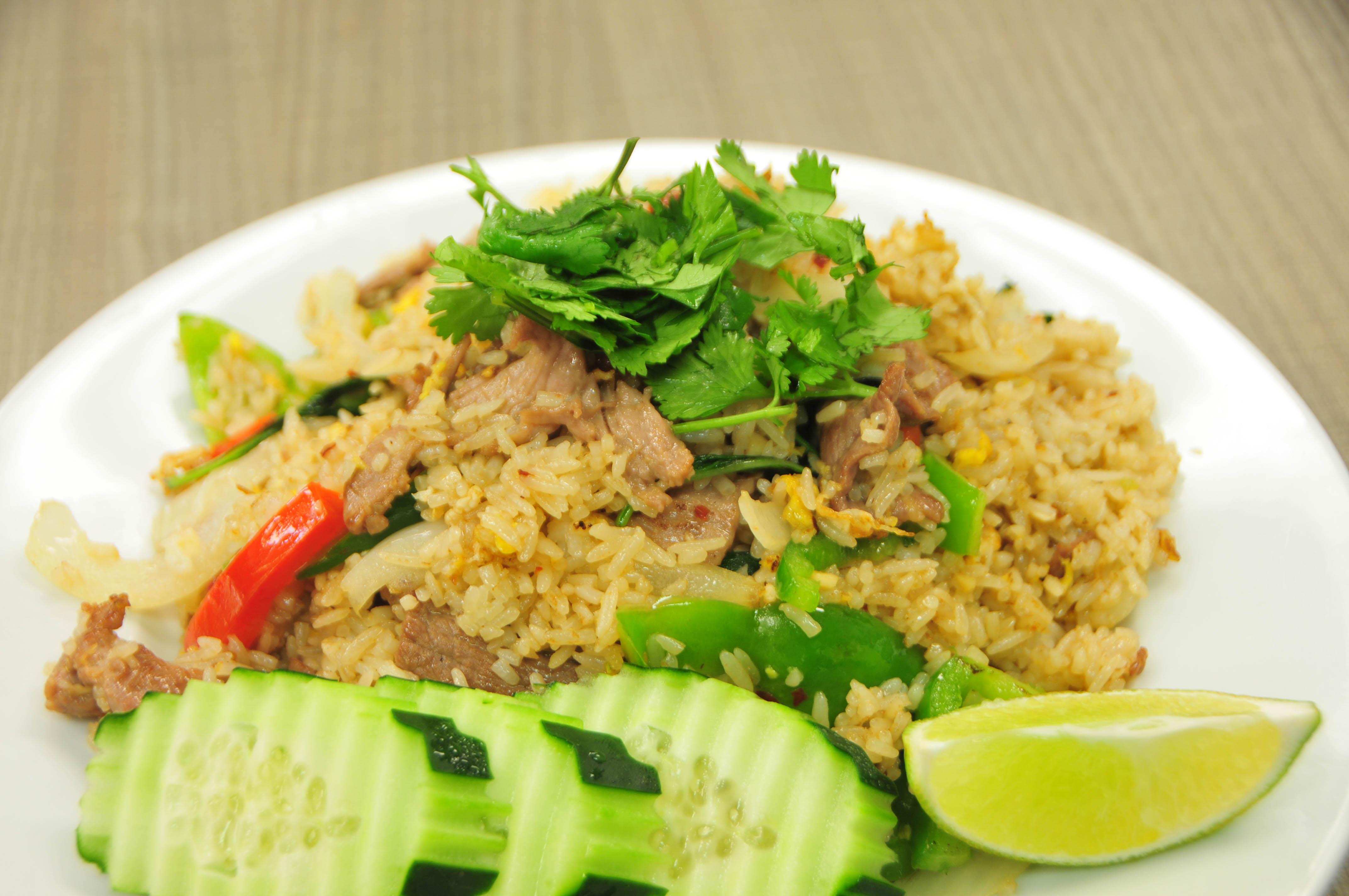 Order Basil Fried Rice food online from Saucy's Thai & Pho store, Plano on bringmethat.com