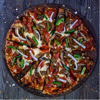 Order Deluxe Pizza - Small food online from Fox's Pizza Den store, Parkhill on bringmethat.com