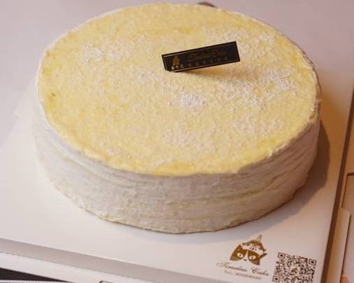 Order Durian Mille Crepe Cake(W)榴莲千层整个 food online from Timeless Tea store, Seattle on bringmethat.com