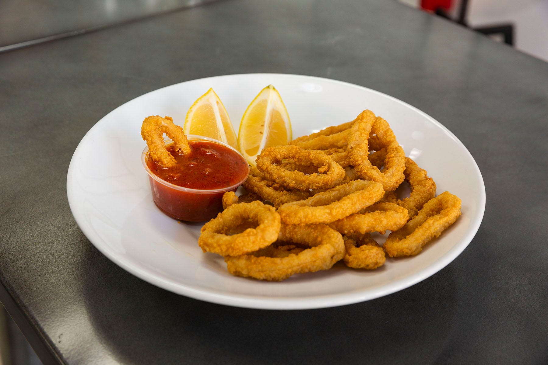 Order Calamari - Appetizers food online from College Pizza store, Boston on bringmethat.com