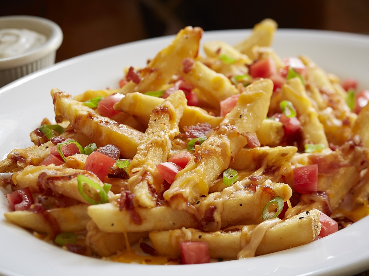 Order Loaded Cheese Fries food online from Smokey Bones store, Liverpool on bringmethat.com