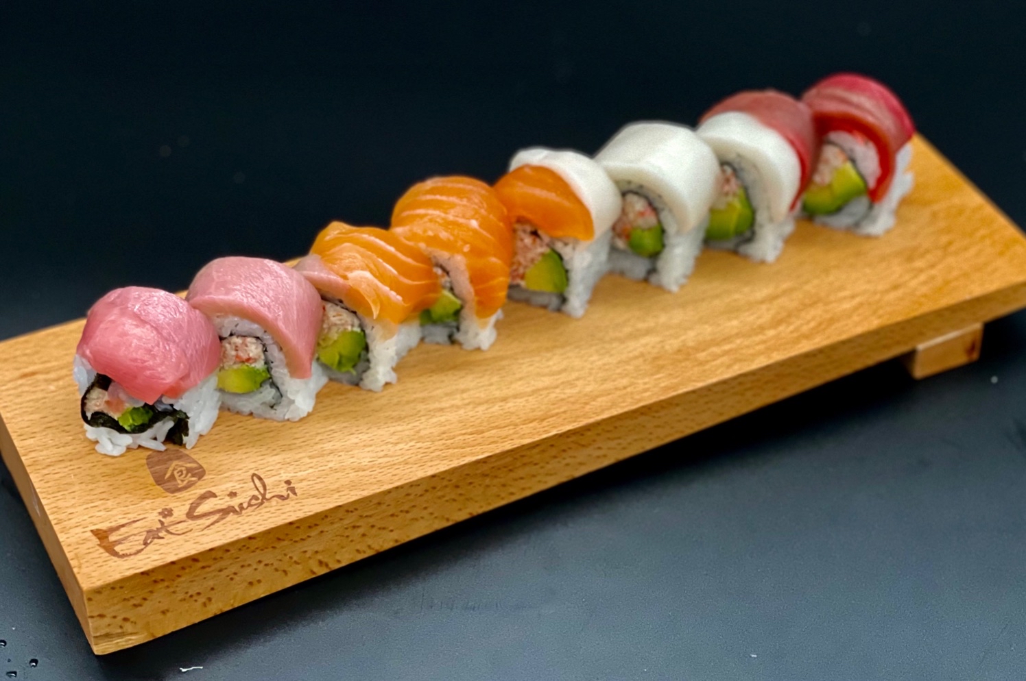 Order Rainbow Roll food online from Eat Sushi store, San Francisco on bringmethat.com