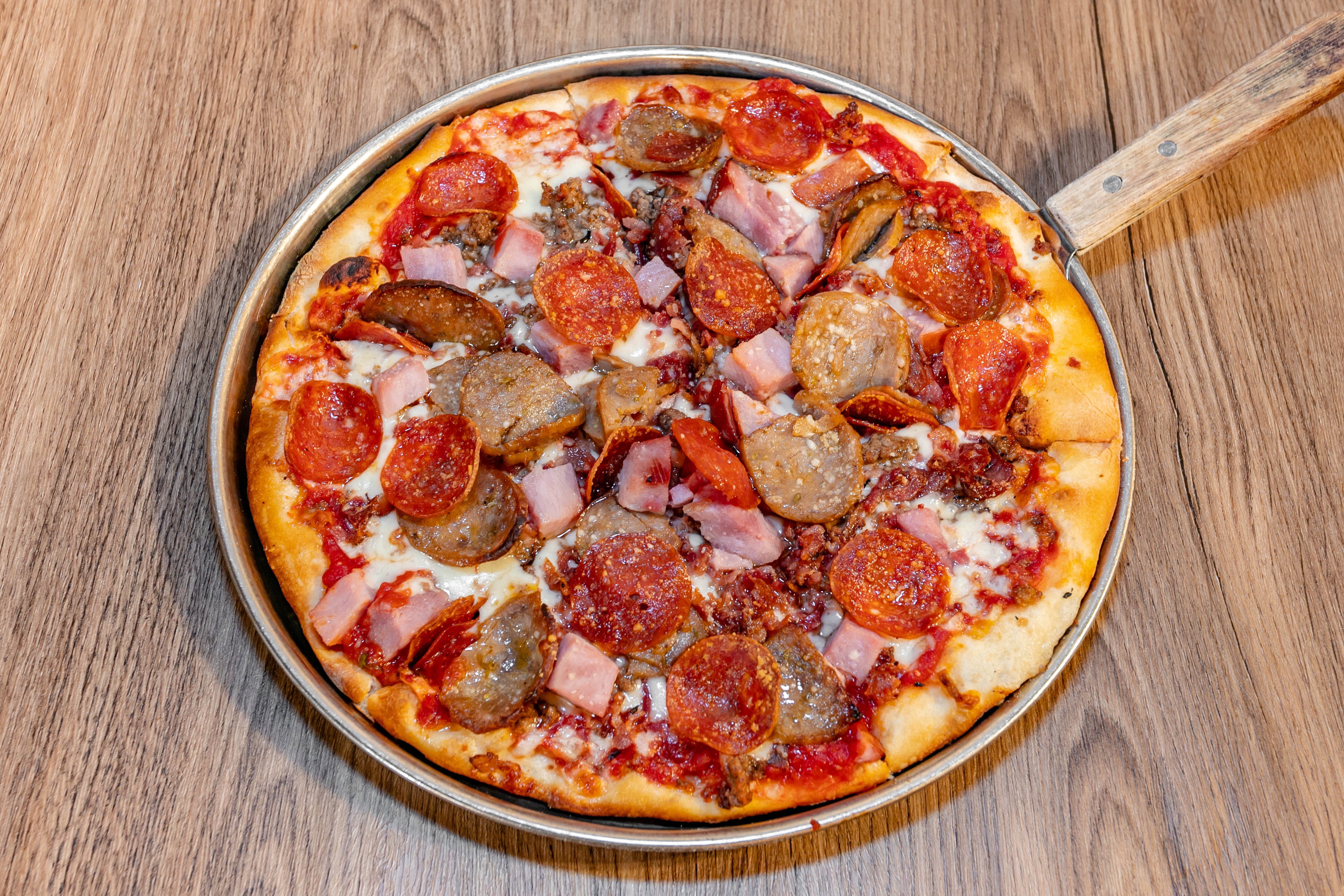 Order Meat Lover's Pizza - 10'' food online from Sopranos Grill store, Braselton on bringmethat.com
