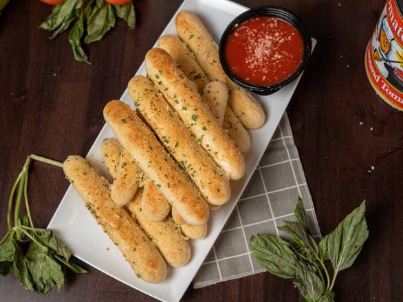 Order Garlic Parmesan Breadsticks food online from Lino & Lucia's Italian Kitchen store, Chicago on bringmethat.com