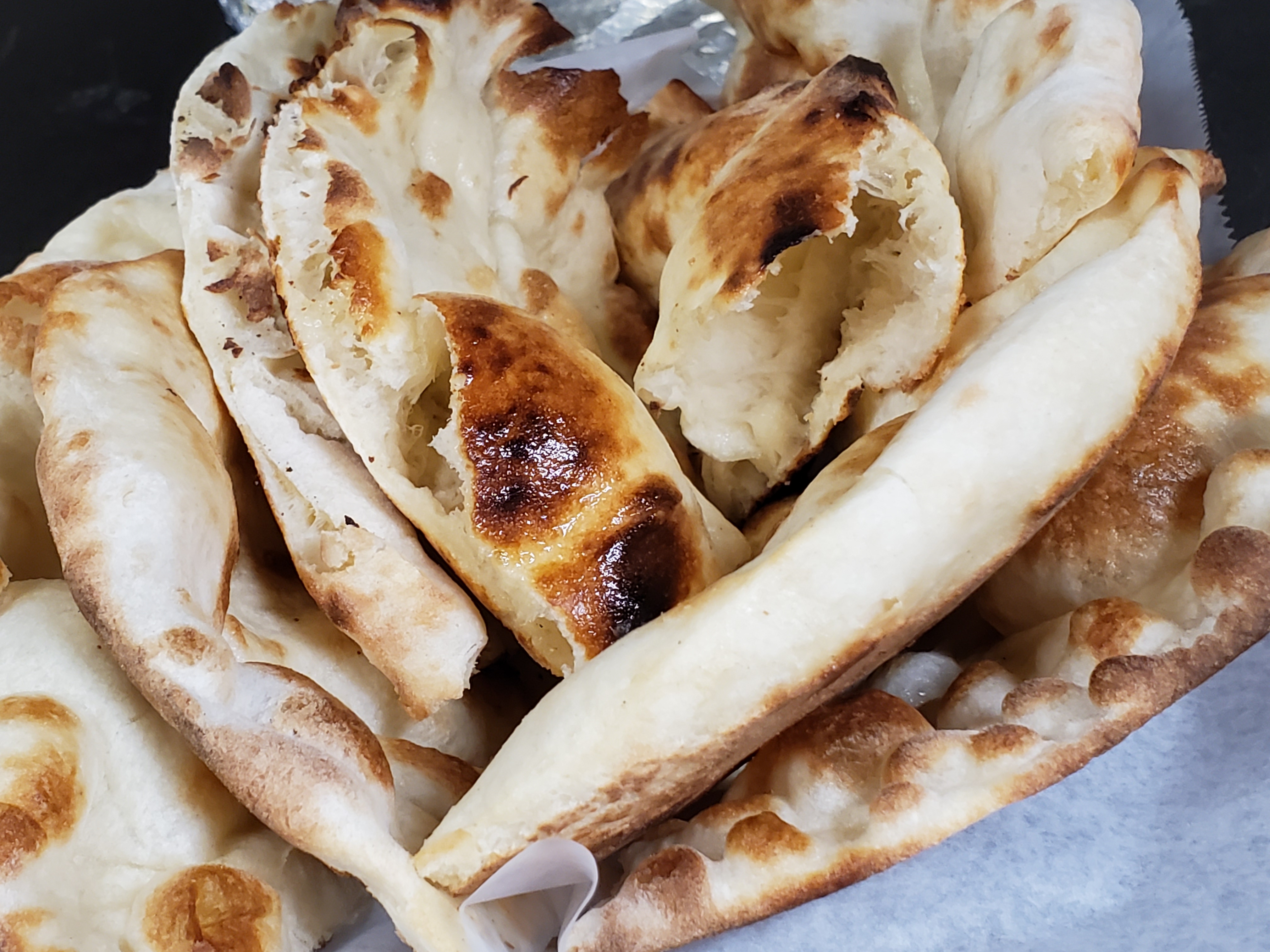 Order Plain Naan  food online from Sherpa Kitchen store, Boulder on bringmethat.com