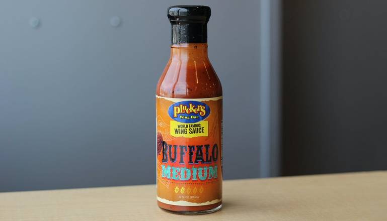 Order Bottle Medium food online from MD Pluckers Wing Factory & Grill store, Round Rock on bringmethat.com