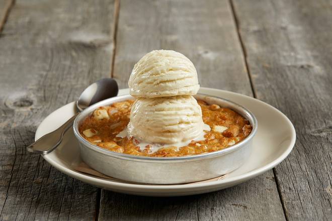 Order White Chocolate Macadamia Nut Pizookie® food online from BJ's Restaurant & Brewhouse store, Aurora on bringmethat.com