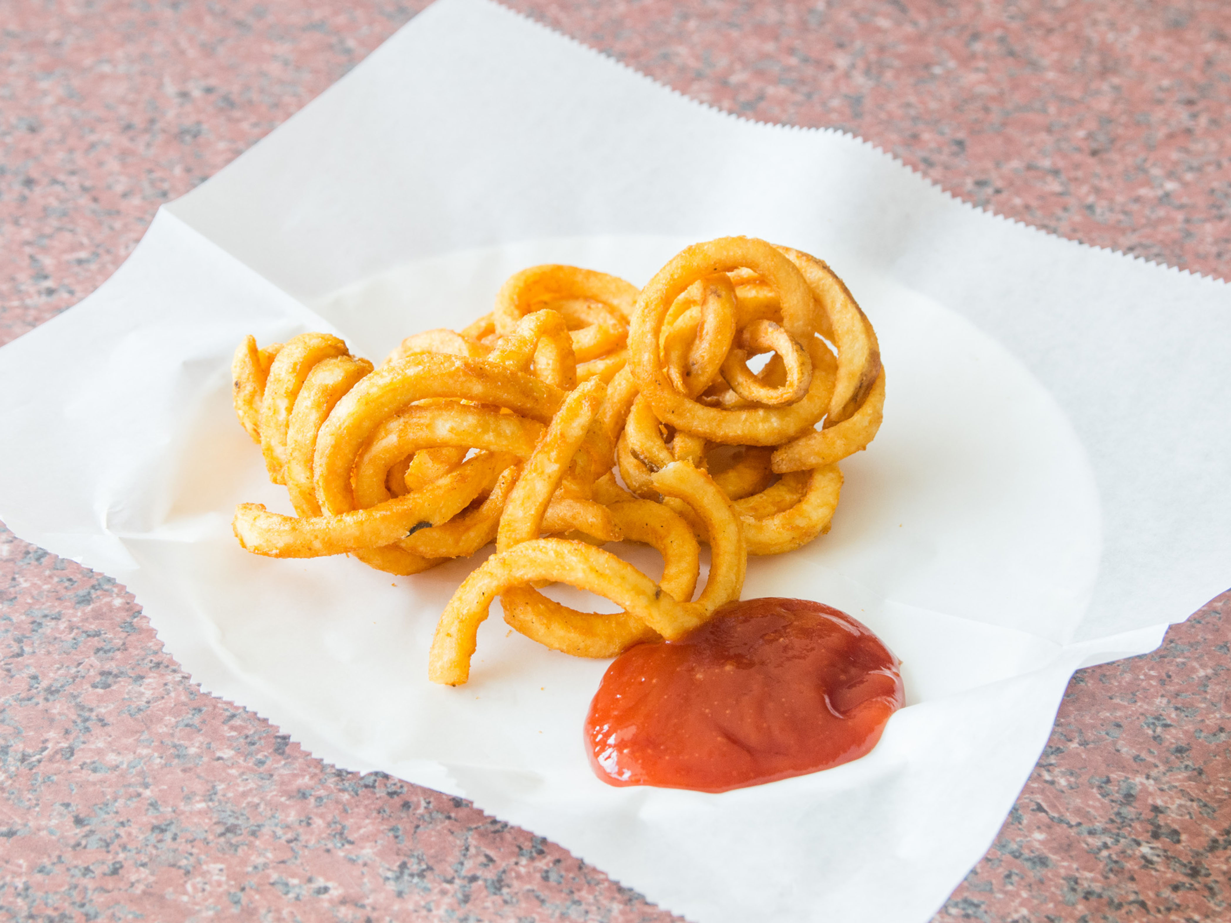 Order Curly Fries food online from Ny Fried Chicken Pizza & Subs store, Essex on bringmethat.com