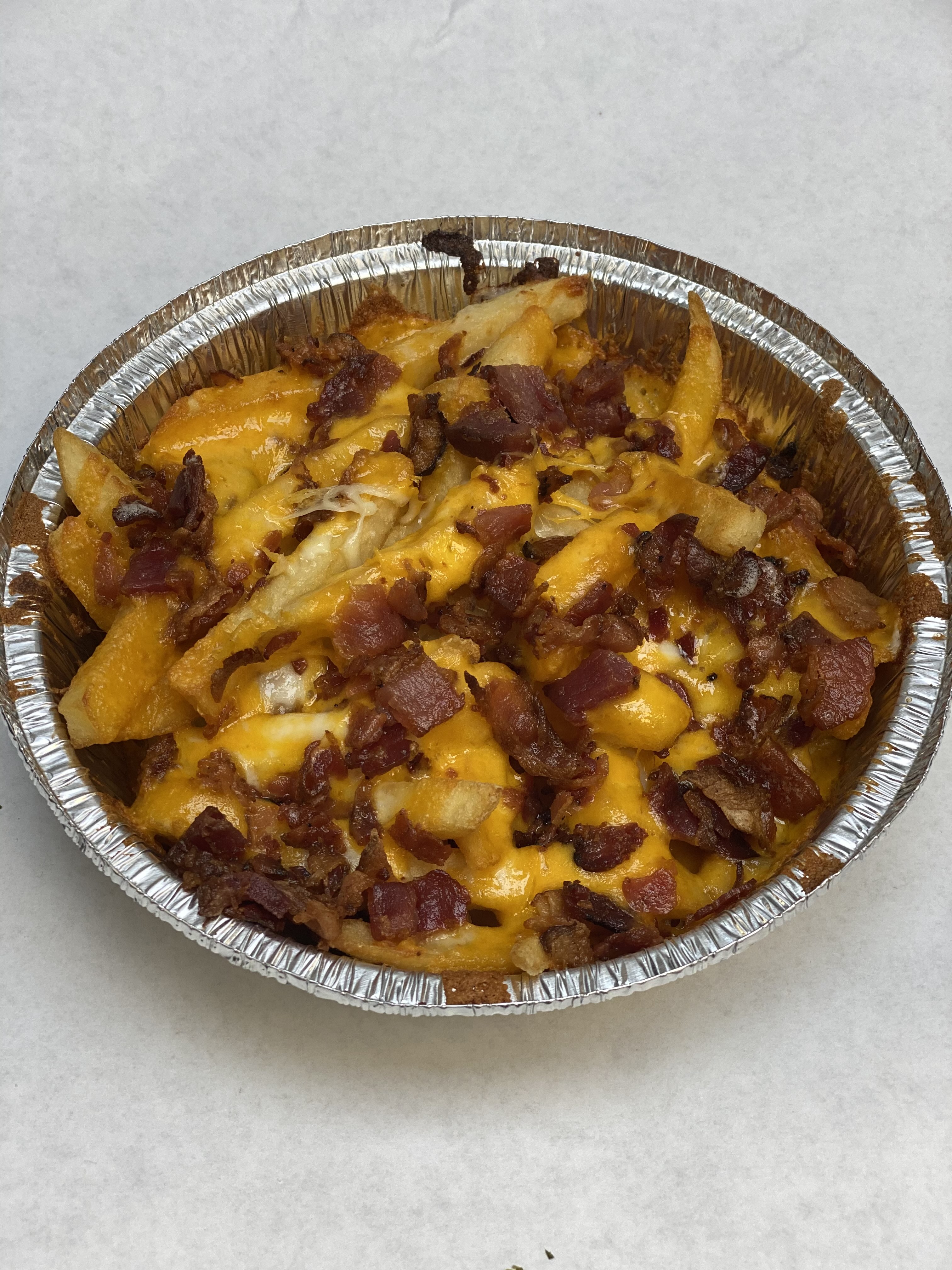 Order Cheddar Bacon Fries food online from Dan Pizza Co store, Webster on bringmethat.com