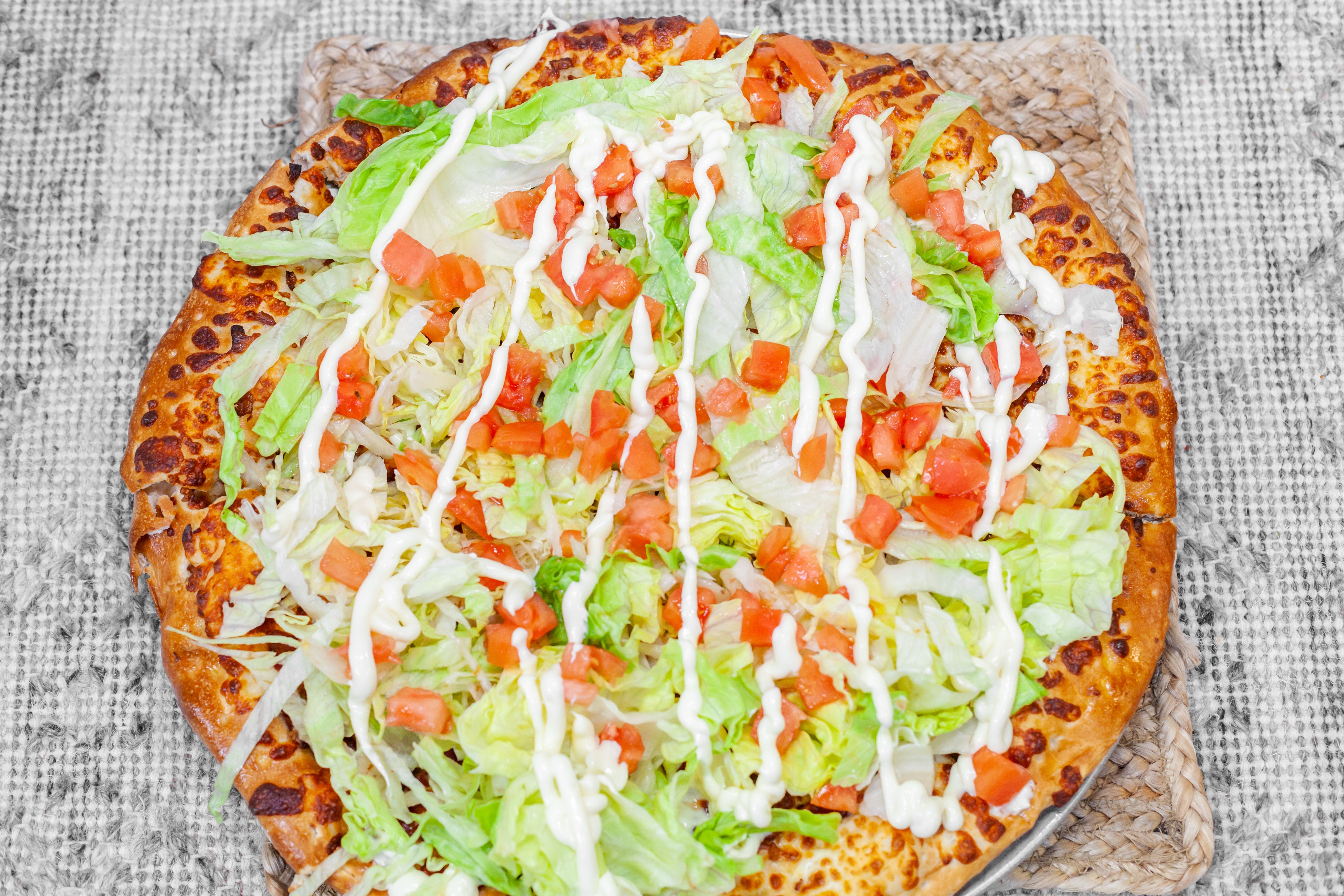 Order BLT Salad Pizza - Medium 12'' food online from Howell 2 Go store, Howell on bringmethat.com
