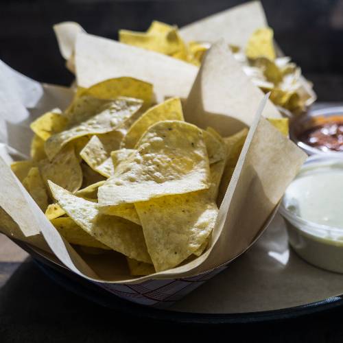 Order Chips & Queso food online from Roscoe's Smokehouse store, Burleson on bringmethat.com