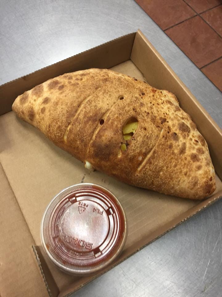 Order Cheese Calzone - Calzone food online from Red Baron Pizza store, Hesperia on bringmethat.com