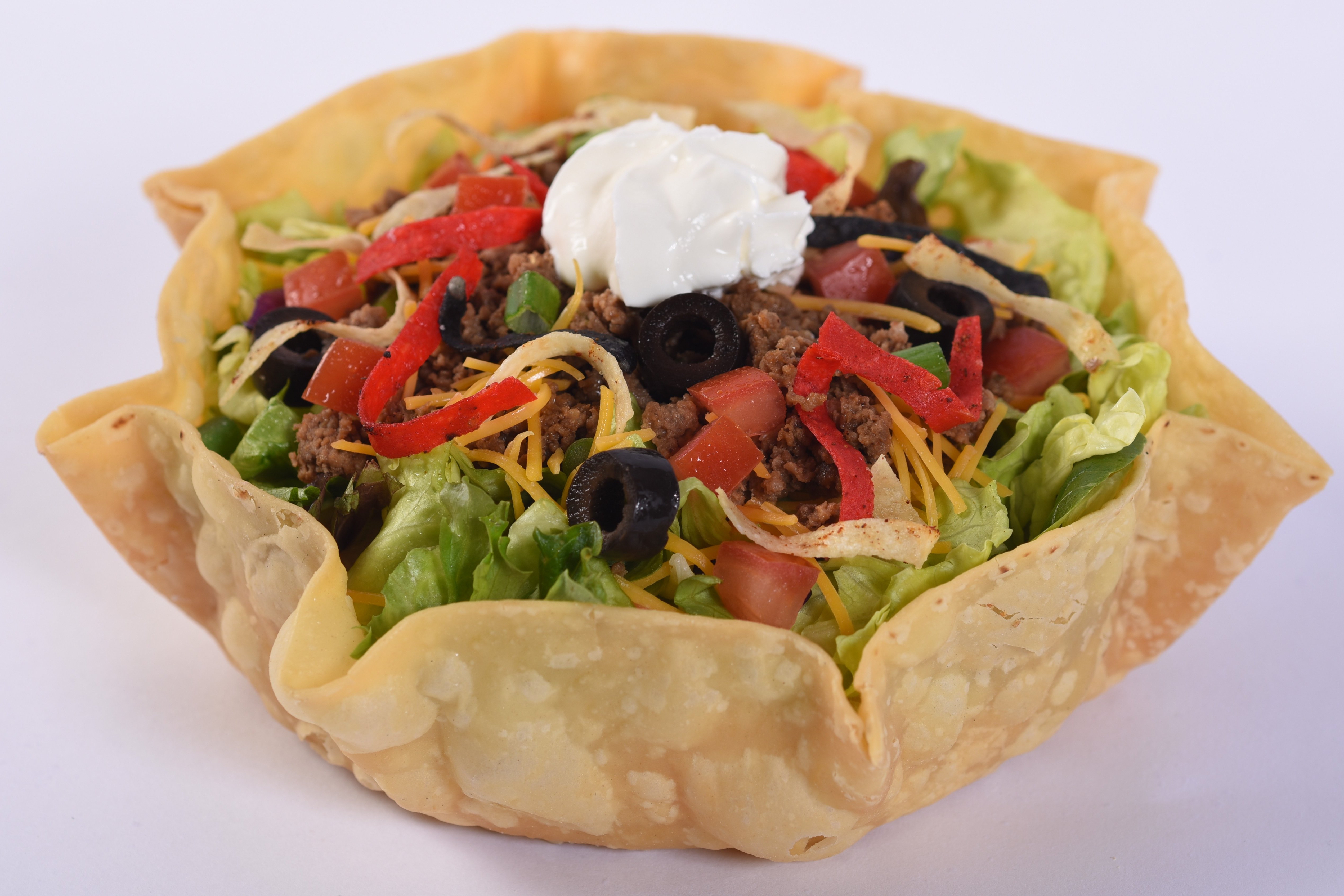 Order Taco Salad food online from Amigos/Kings Classic store, La Vista on bringmethat.com