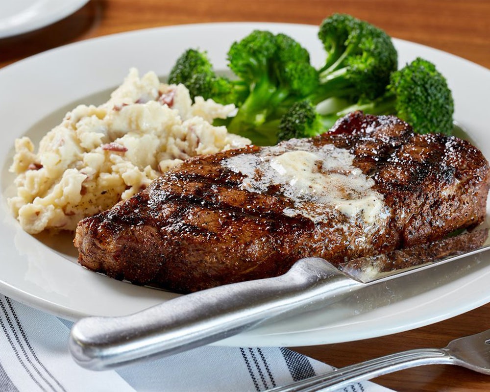Order NY Strip food online from Burtons Grill store, South Windsor on bringmethat.com