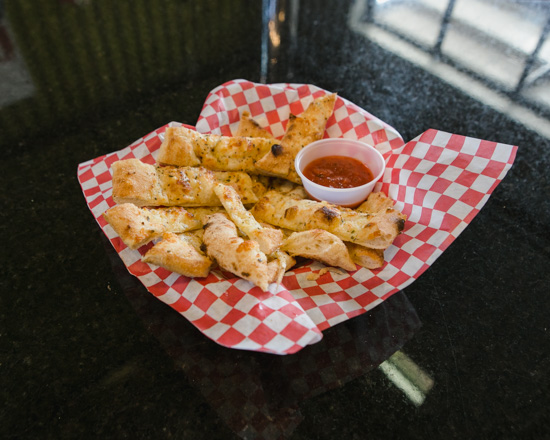 Order Parm Strips food online from Aroma Artisan Pizza  store, Cedar Rapids on bringmethat.com