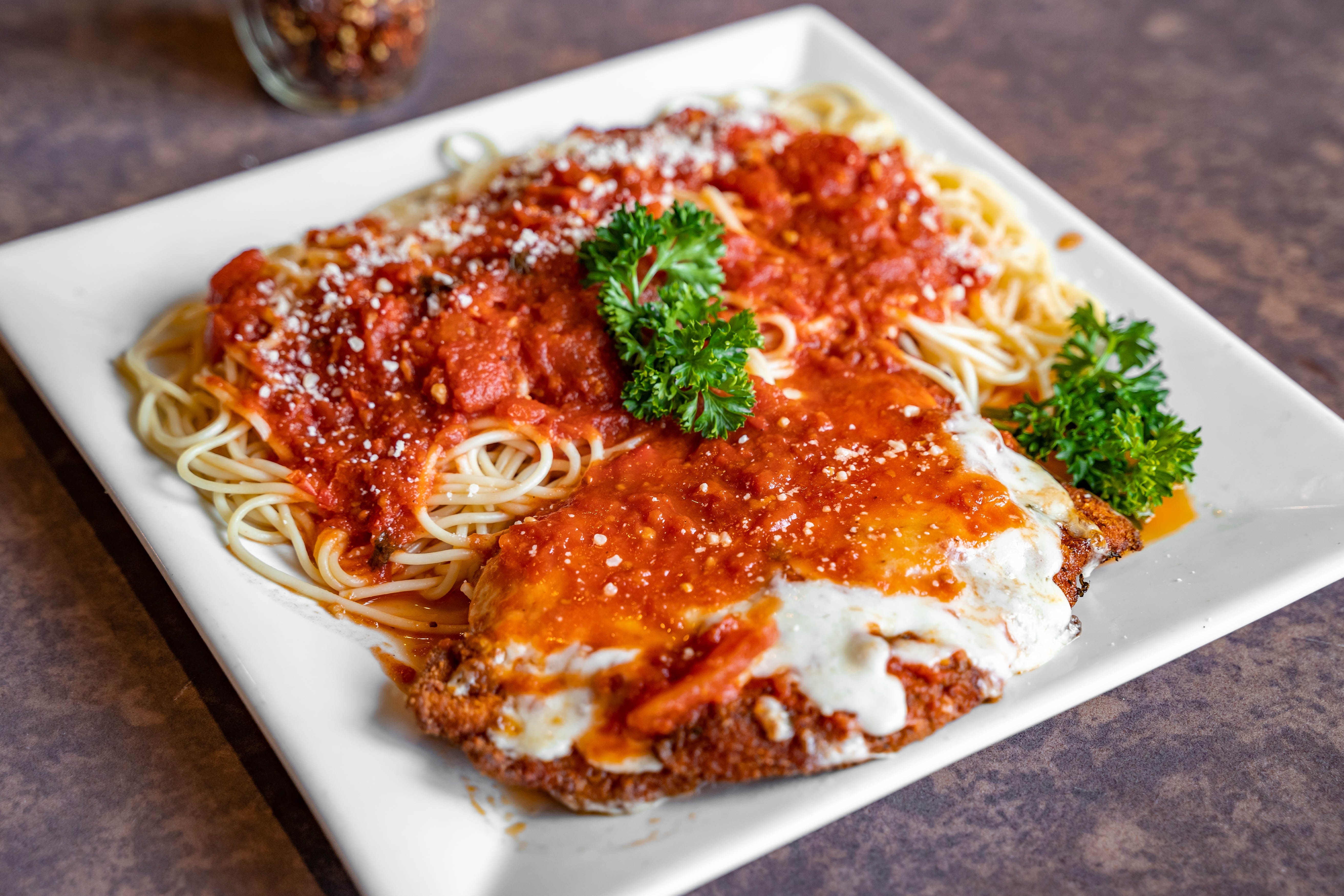 Order Chicken Parmigiana - Entree food online from Father & Sons store, Woodbury on bringmethat.com