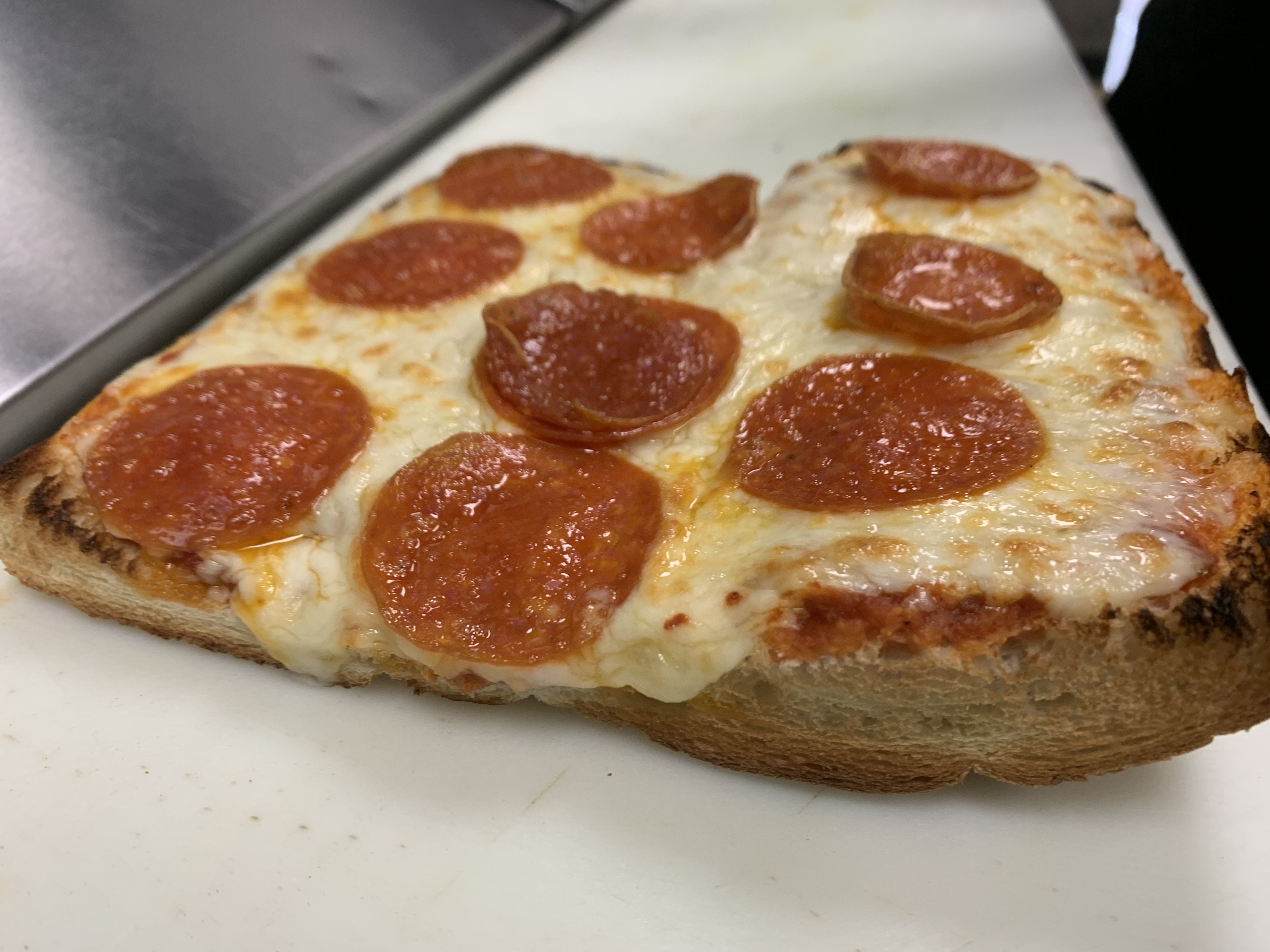 Order Pizza bread  food online from The Pickled Deli store, Visalia on bringmethat.com
