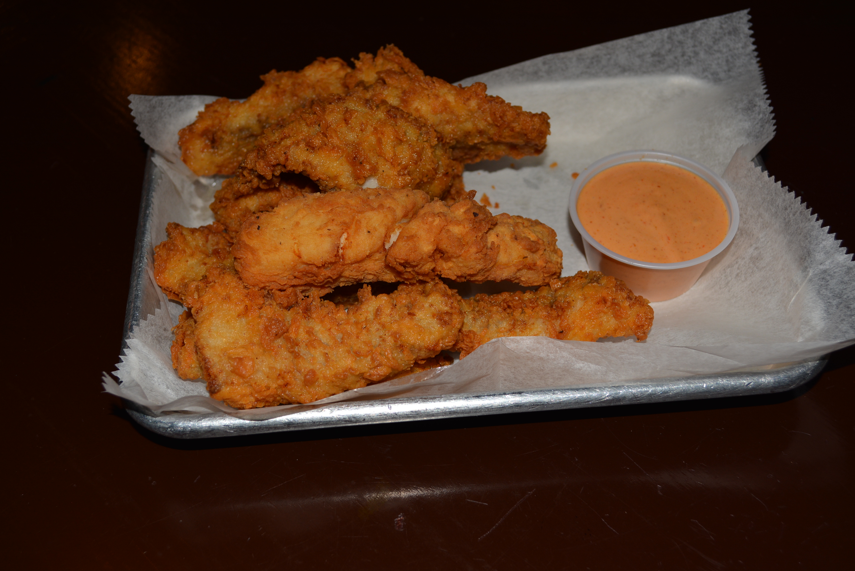 Order Wild Blue catfish strips food online from Burger District store, Arlington on bringmethat.com