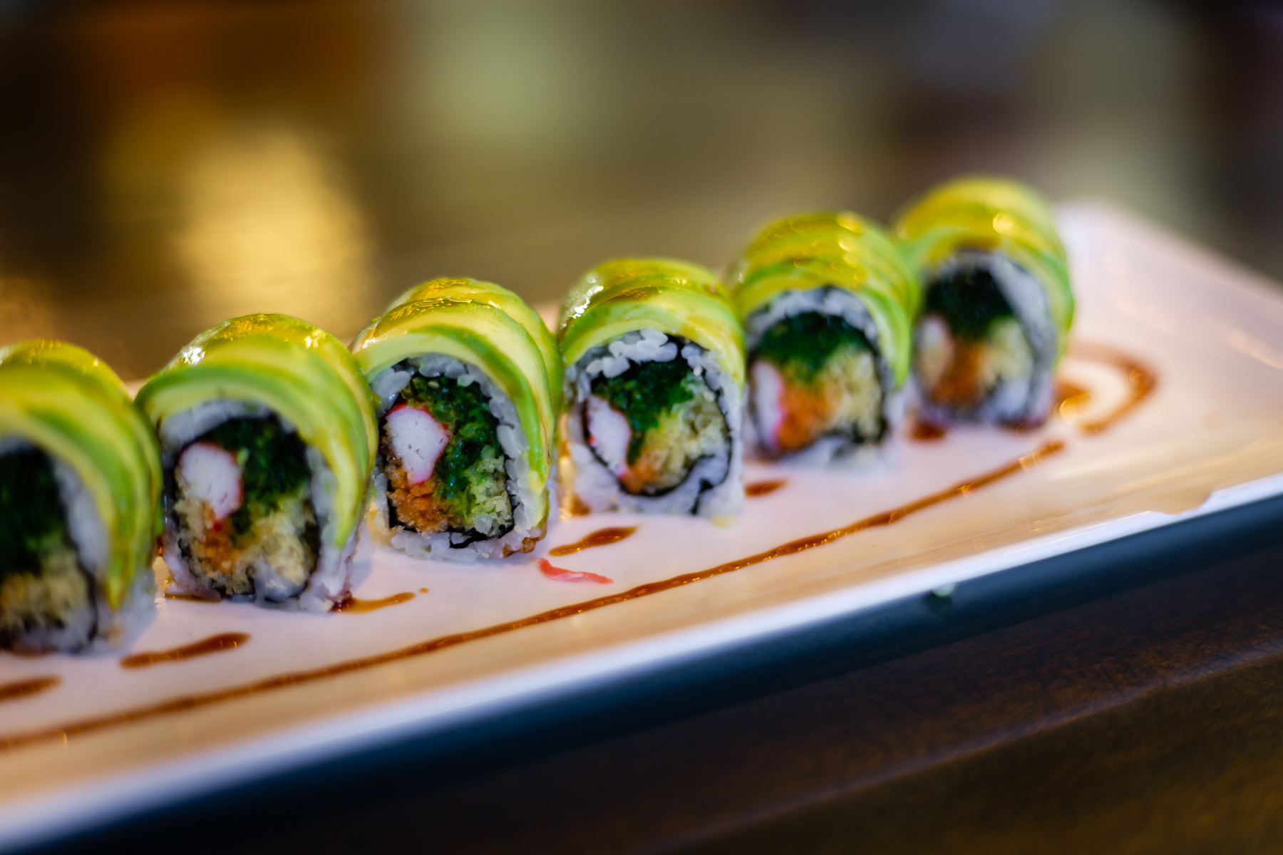 Order Caterpillar Eel Roll Special food online from Oshi Poke Bowl And Sushi store, Alpharetta on bringmethat.com