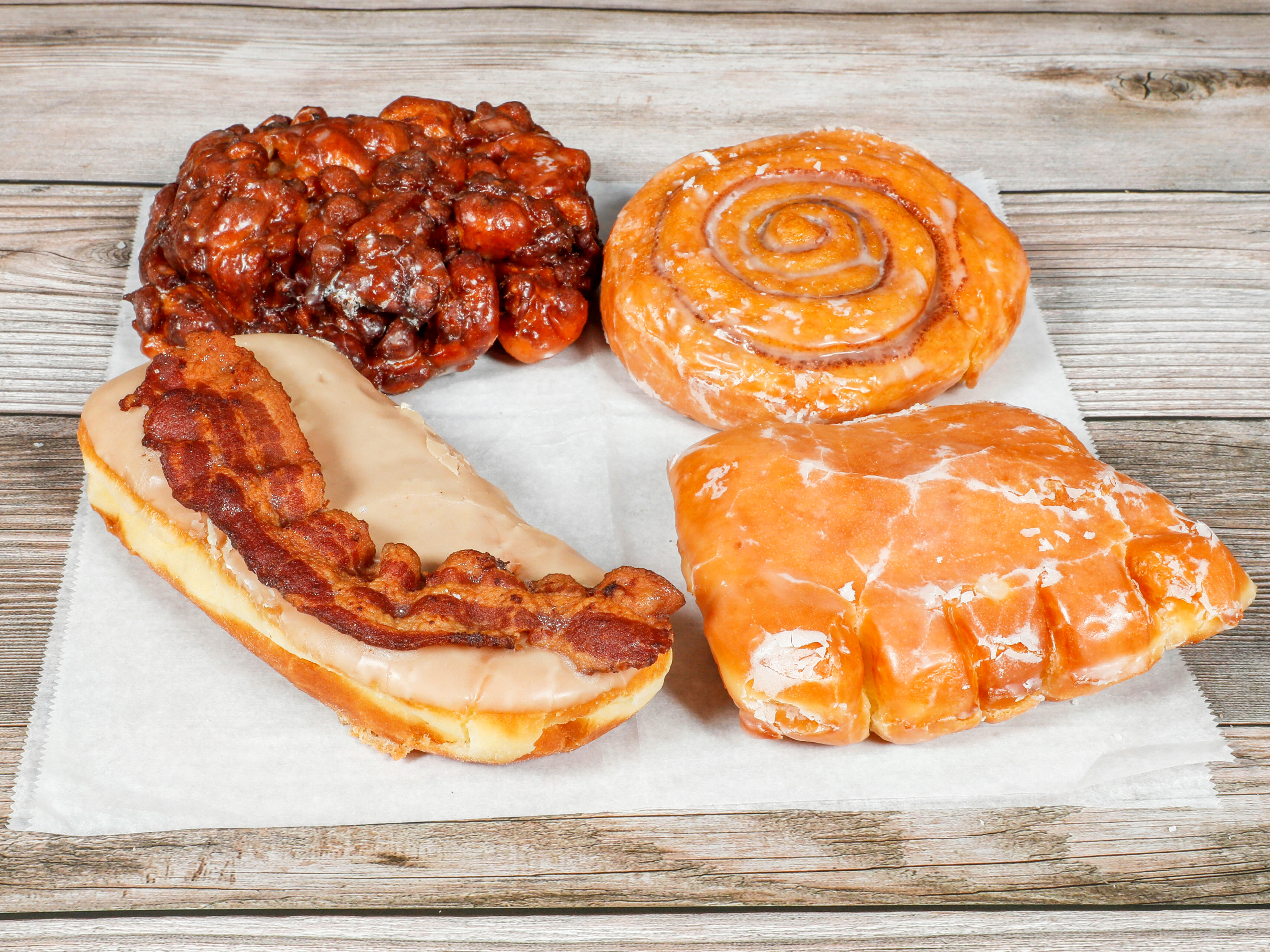 Order Bearclaw, Cinnamon Roll, Apple Fritter, or Bacon Bar food online from Donuts & Coffey store, Sacramento on bringmethat.com