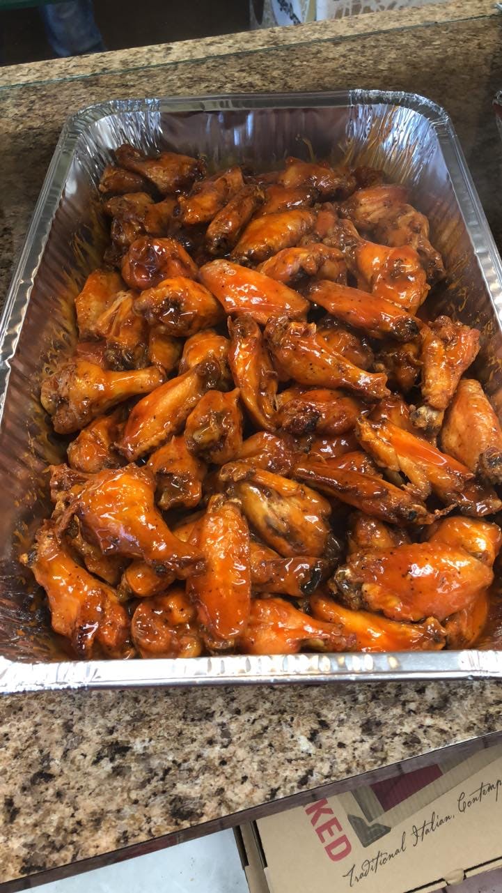 Order Buffalo Wings - 12 Pieces food online from Luigi's Pizzarama store, Levittown on bringmethat.com