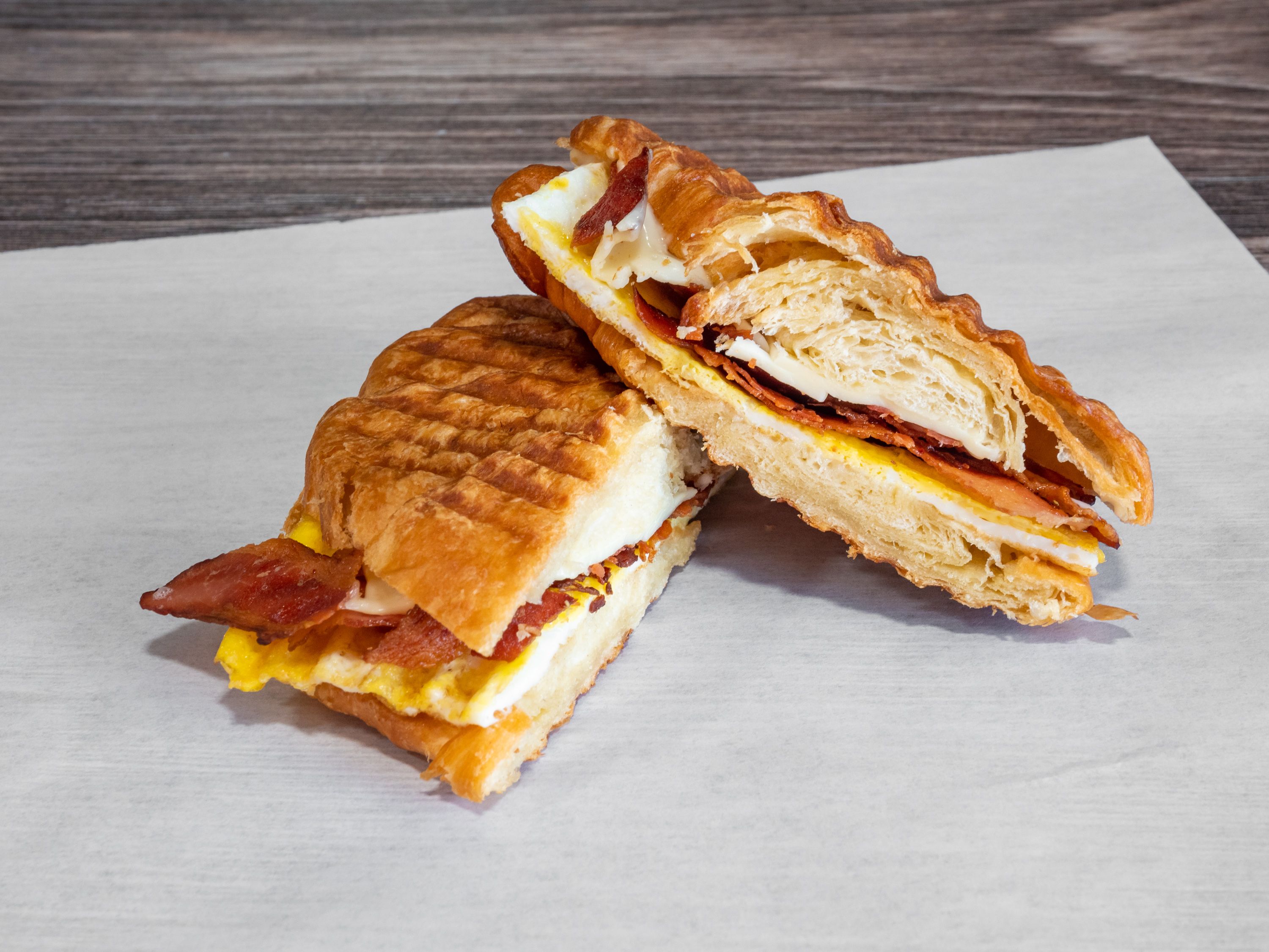 Order Eggs and Bacon Sandwich food online from Oddi Cafe store, San Jose on bringmethat.com