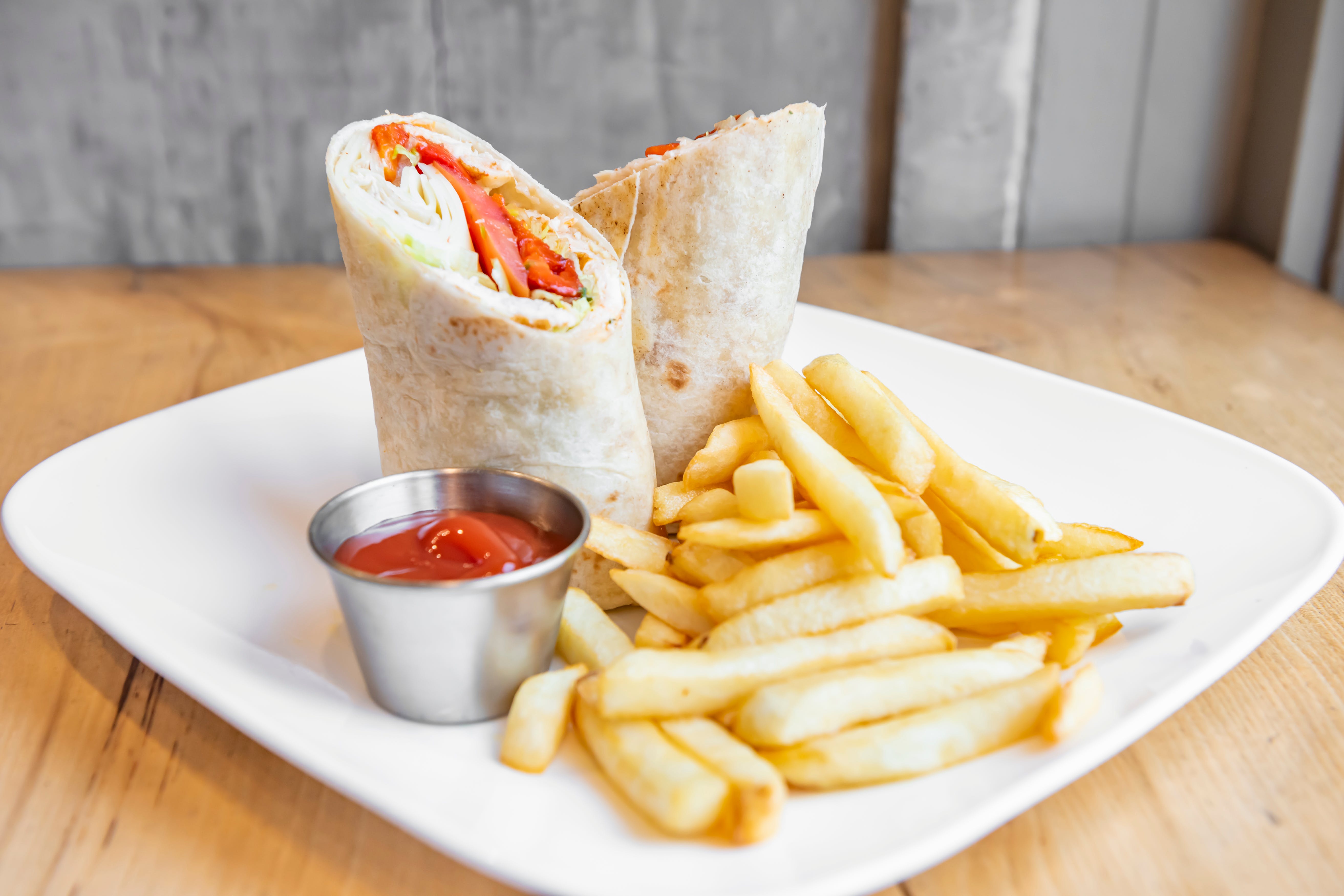 Order Grilled Chicken Wrap - Wrap food online from Garrison Pizza Cafe Inc store, Garrison on bringmethat.com