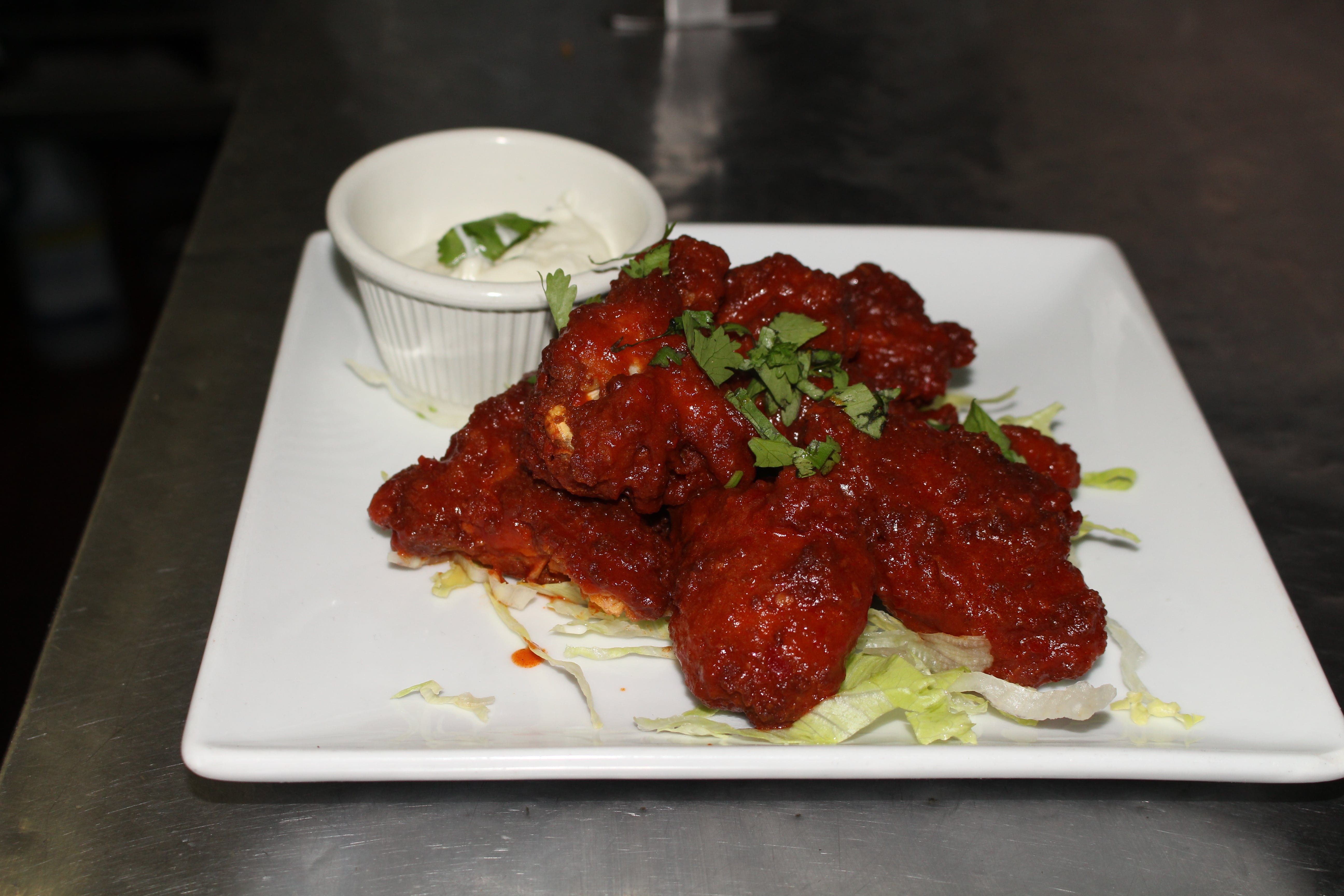 Order BBQ Chicken Wings food online from Refried Beans store, New York on bringmethat.com