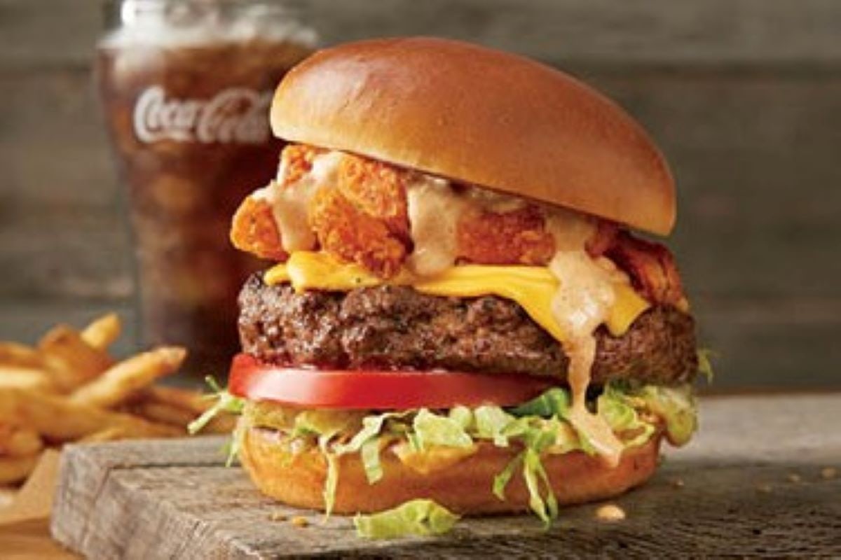 Order The Bloomin' Burger®* food online from Outback Steakhouse store, Delray Beach on bringmethat.com