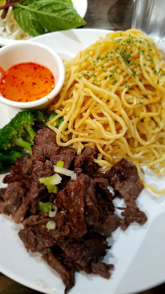 Order 22. Charbroiled Pork Garlic Noodle food online from Perilla Vietnamese Cuisine store, San Francisco on bringmethat.com