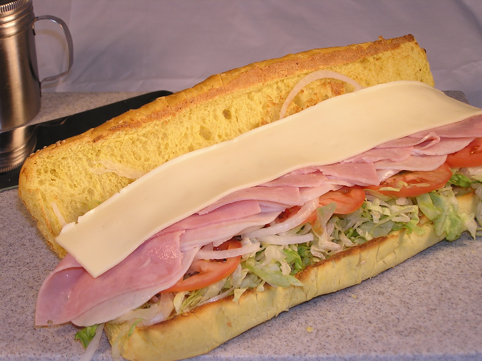Order Turkey & Ham Sub food online from Calz Pizza Subs & Chicken Wings store, Virginia Beach on bringmethat.com