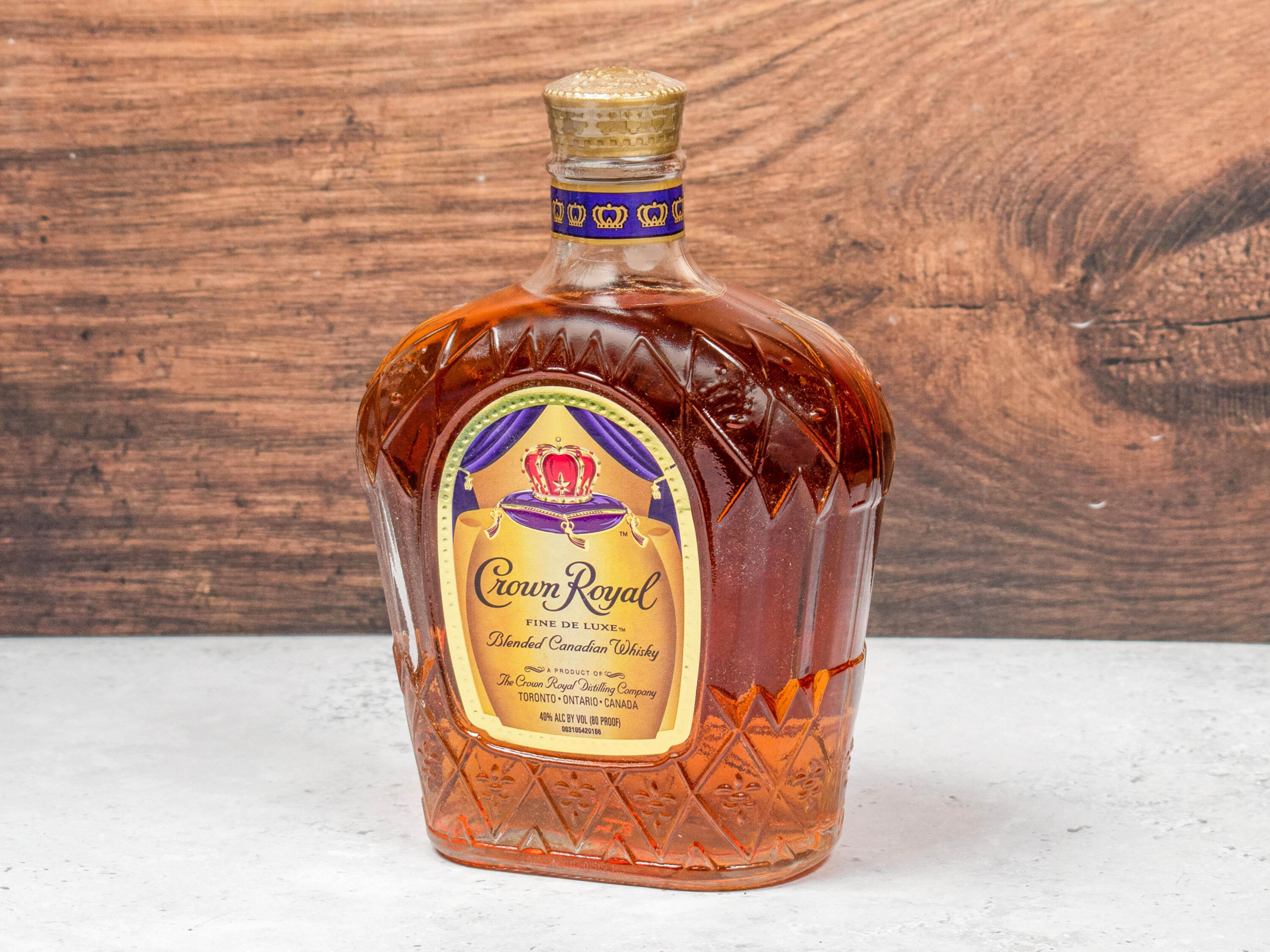Order 750 ml. of Crown Royal Deluxe Whiskey food online from Liquor Deli store, La Puente on bringmethat.com