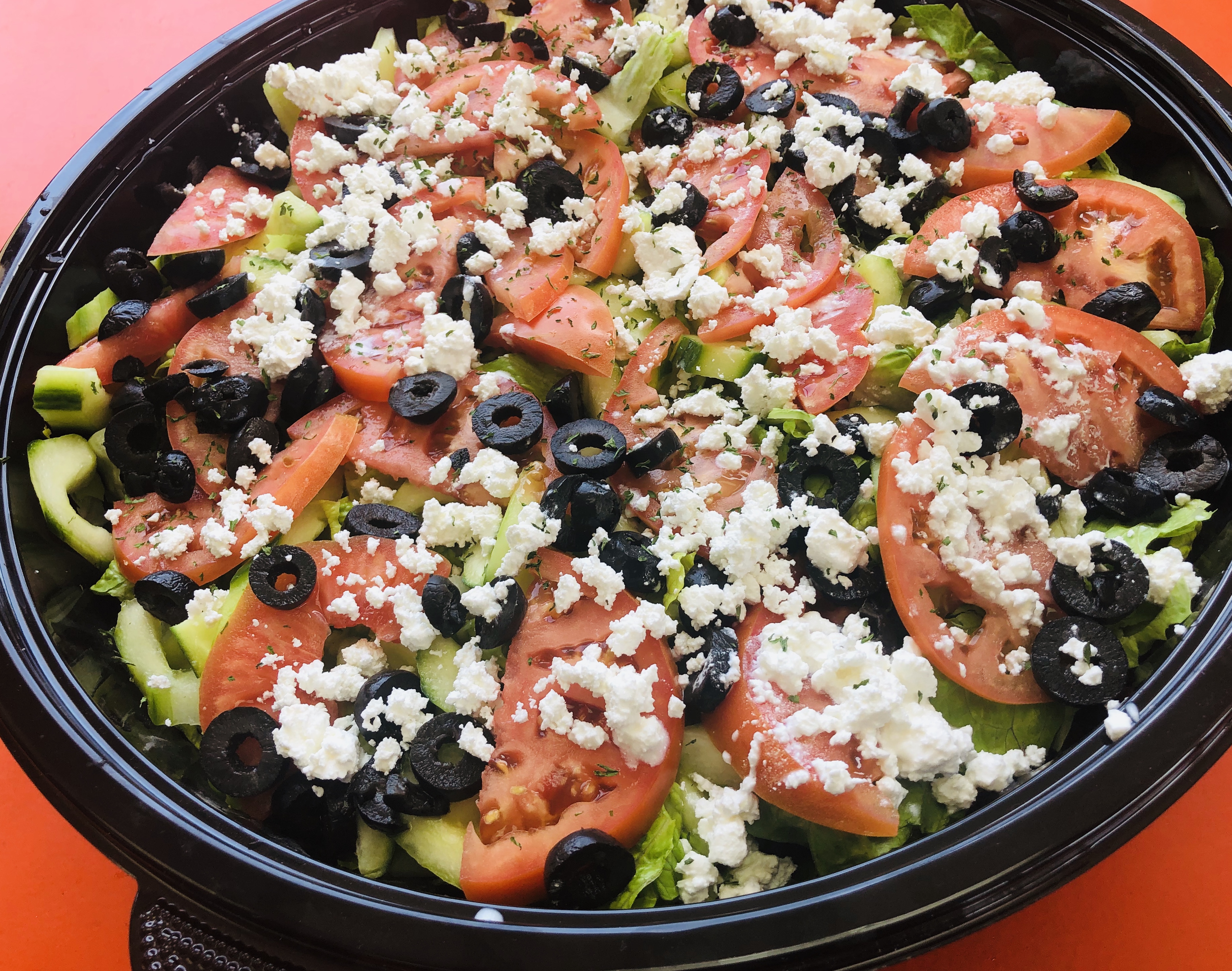 Order Greek Salad food online from Pizza Cucina store, Westbury on bringmethat.com