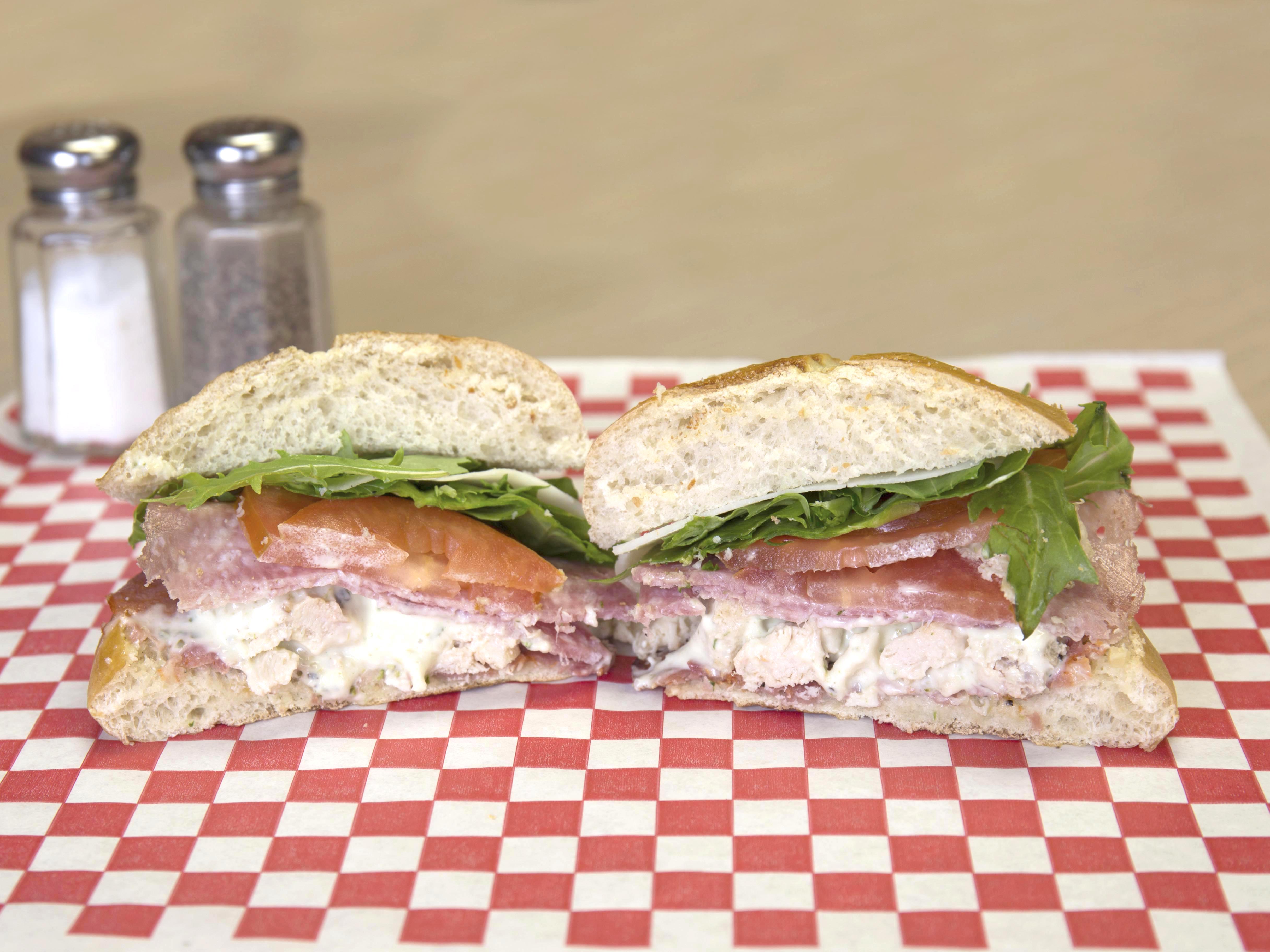 Order Saltimbocca Panini food online from Marco Polo Cheesesteaks store, New Braunfels on bringmethat.com