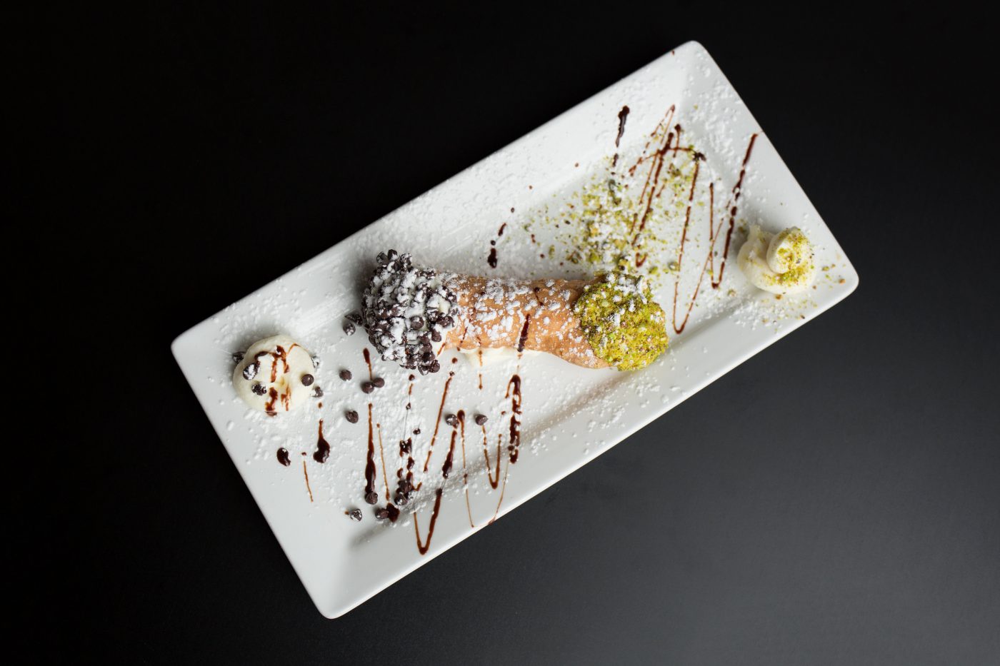 Order Homemade Cannolis Chocolate Chip  food online from Piccola Italia Ristorante store, Manchester on bringmethat.com