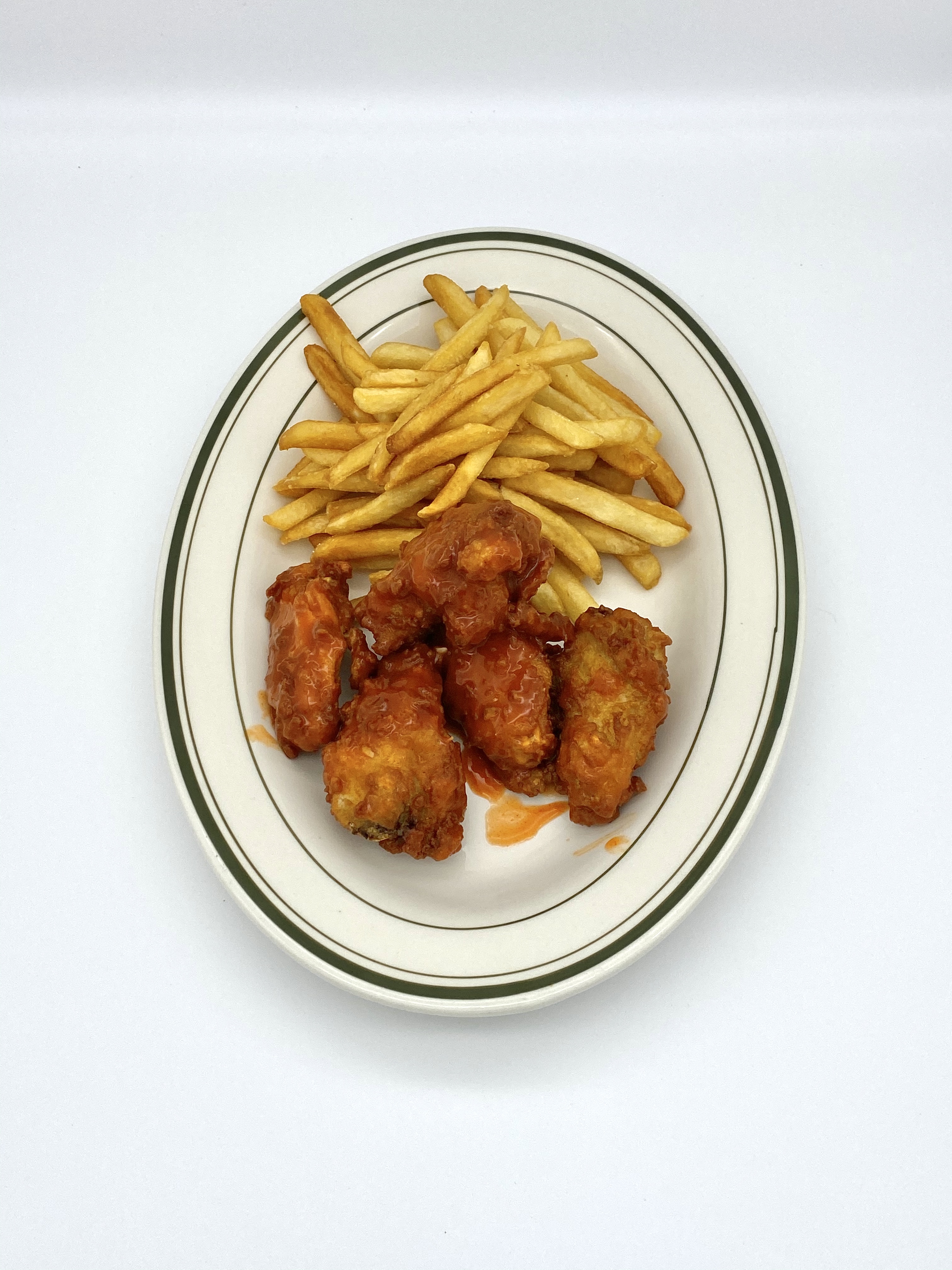 Order Buffalo wings with Fries  food online from Tacos Y Jugos Genesis store, Elmhurst on bringmethat.com