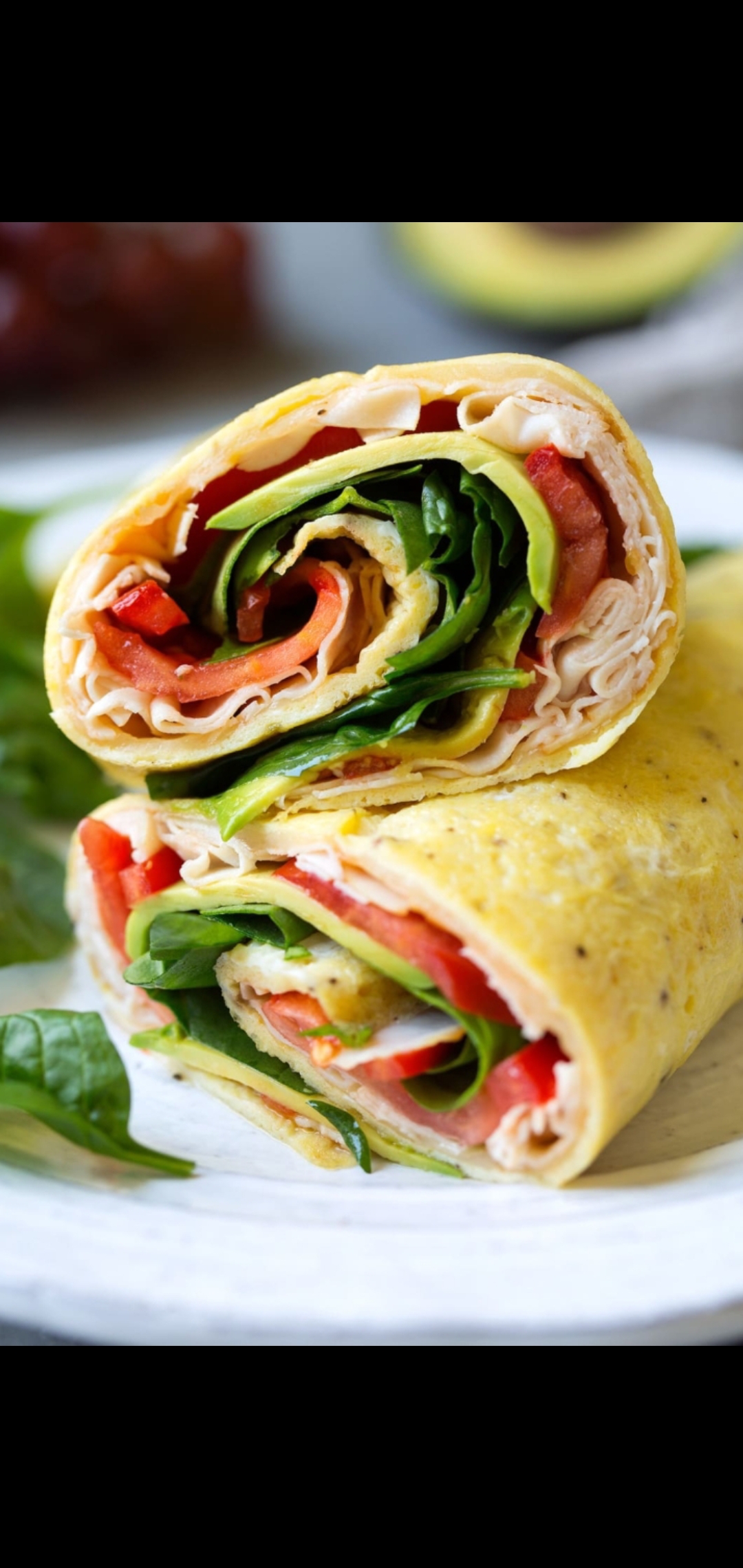 Order Boar's Head Smoked Turkey Breast With Avocado Roasted Peppers Baby Spinach On Wrap  food online from American Gourmet Foods Deli store, New York on bringmethat.com