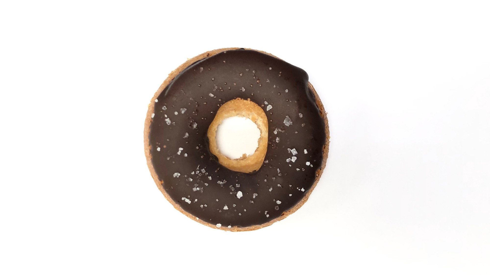 Order Vegan Donut - Dark Chocolate Sea Salt food online from Bodhi Leaf Coffee Traders store, Newhall on bringmethat.com