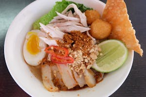 Order Noodles Tomyum Soup food online from Red Chicken store, San Gabriel on bringmethat.com
