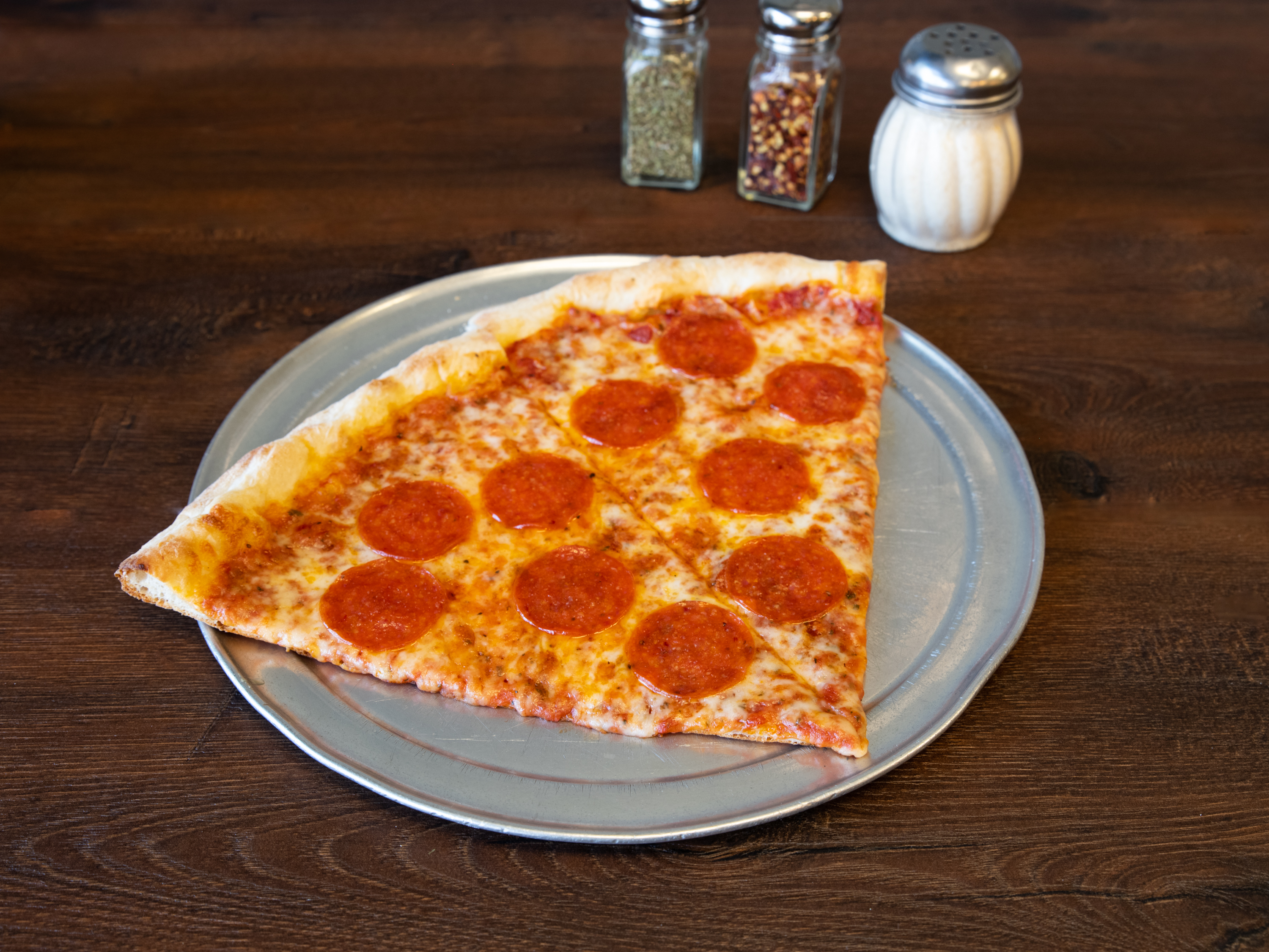 Order Specialty Pizza Slice food online from Italian Village Pizza store, Orlando on bringmethat.com