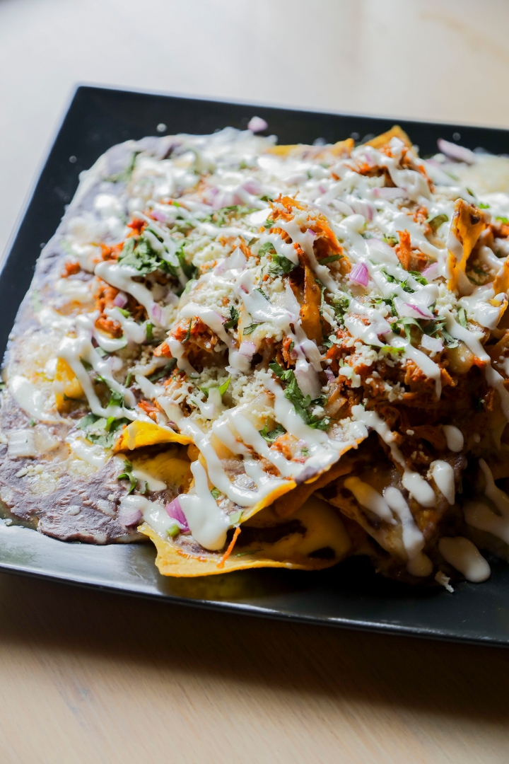 Order Nachos food online from Totopos store, Cary on bringmethat.com