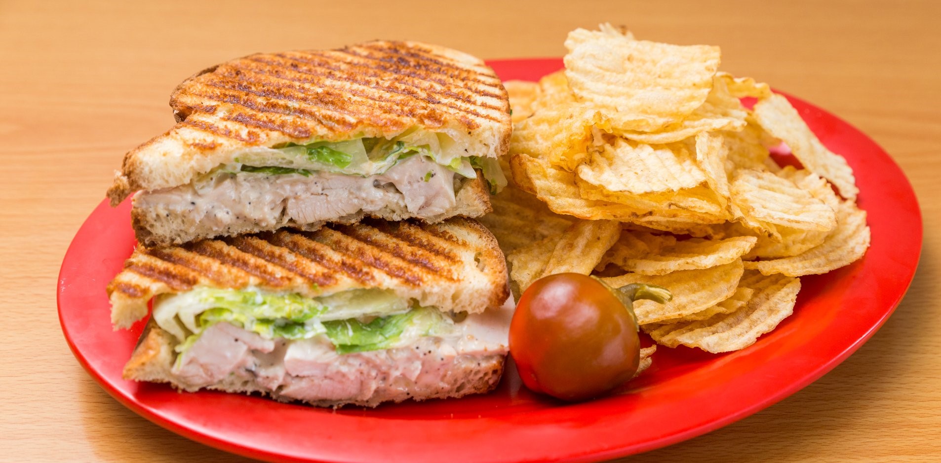 Order Chicken Caesar Panini food online from Panini store, Signal Hill on bringmethat.com