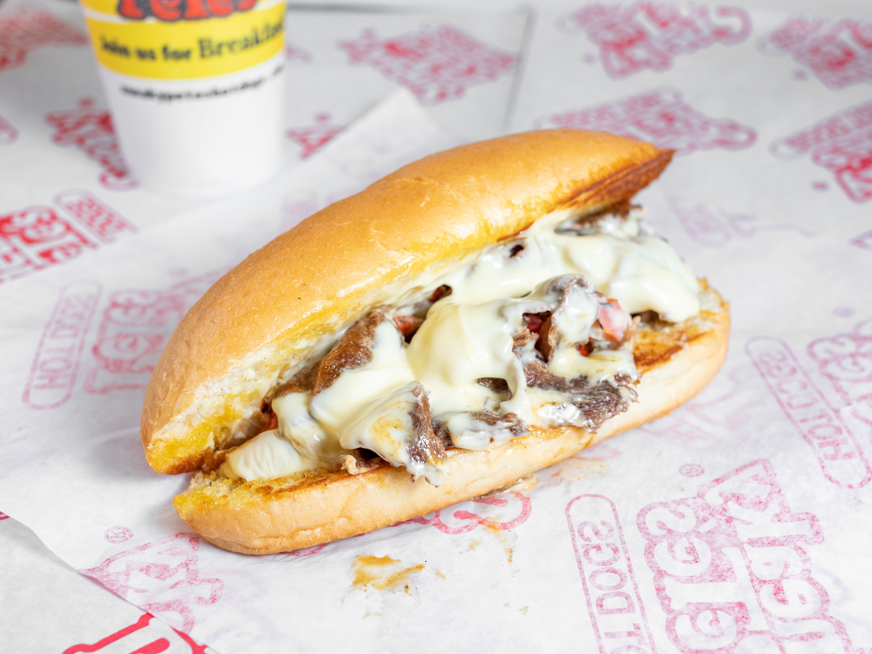 Order 19. Philly Cheesesteak food online from Sneaky Petes Hot Dogs store, Hoover on bringmethat.com