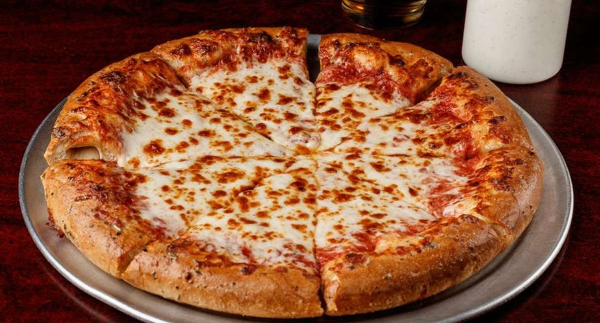 Order Large One-Topping Pizza Tuesday Special - Special food online from Wings Pizza N Things store, Temple on bringmethat.com