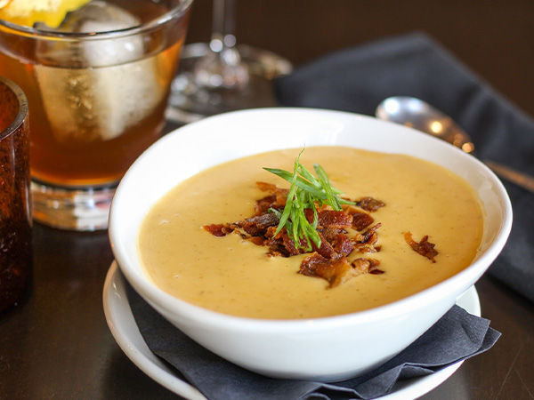 Order Loaded Baked Potato Soup food online from Firerock Grille store, Caledonia on bringmethat.com