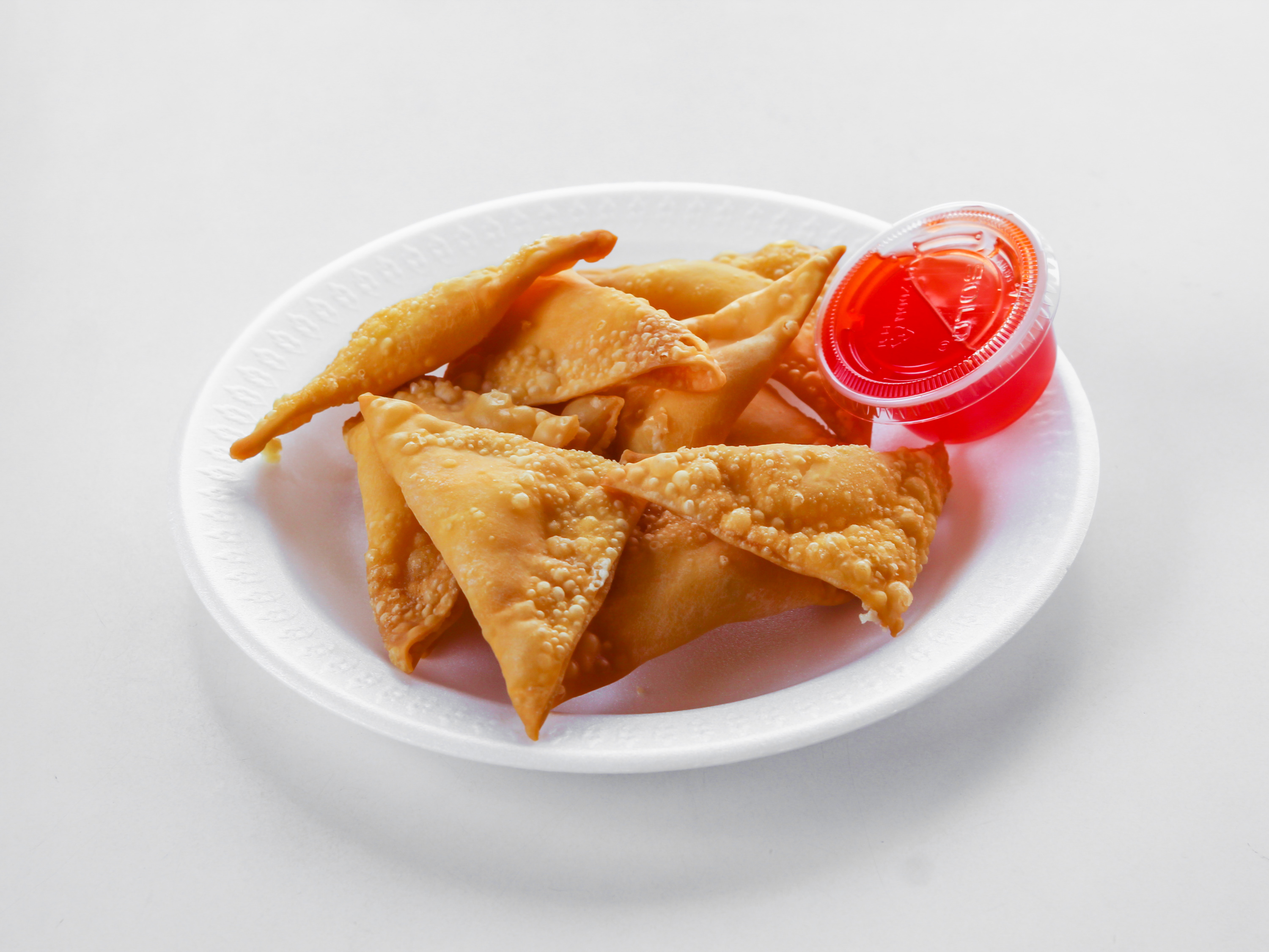 Order 10. Large Crab Rangoon food online from Yummy Garden store, Rochester on bringmethat.com
