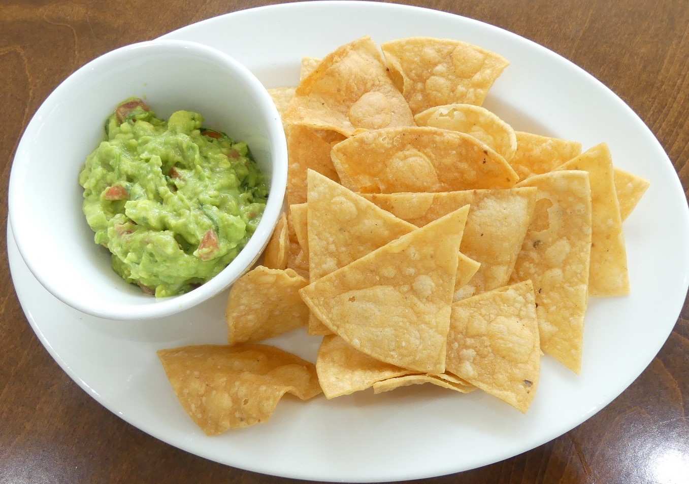 Order Chips - Salsa and Guacamole food online from Dinah Poolside Restaurant store, Palo Alto on bringmethat.com
