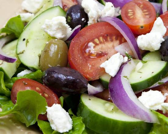 Order Greek Salad food online from Pizza Fino - S. Fry Rd. store, Katy on bringmethat.com
